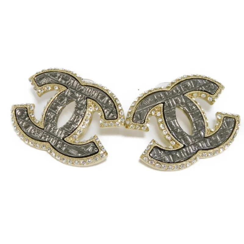 Stud Earrings with Star Motifs -Chanel Champagne  Clear Rhinestone Ruthenium Stud Earrings (Pre-Owned)