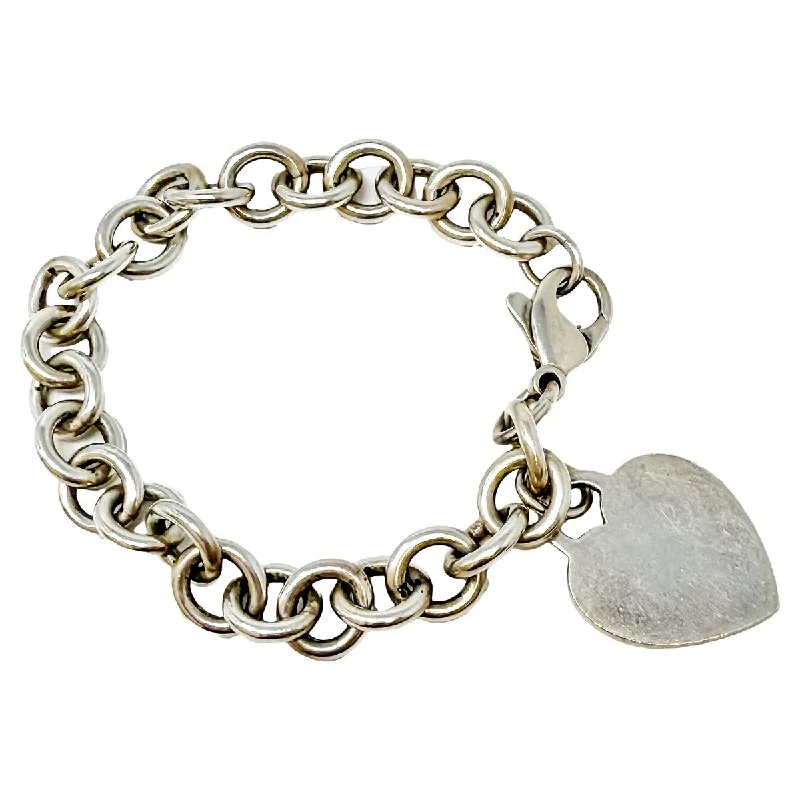 Bangles with blue quartz for cool tones -Tiffany & Co Sterling Silver Heart Tag Charm Bracelet