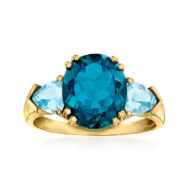 Rings with coral stones for vibrant pop -Ross-Simons Tonal Blue Topaz 3-Stone Ring in 14kt Yellow Gold