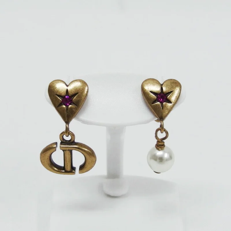 Stud Earrings with Etching -Christian Dior Metal Stud Earrings (Pre-Owned)