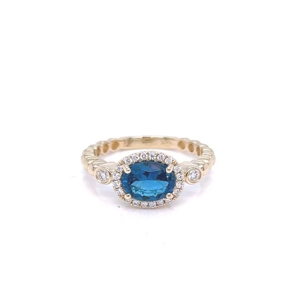 Rings with tiger eye for warm tones -14K Yellow Gold 1.68ctw Oval Blue Topaz & Diamond Halo Ring