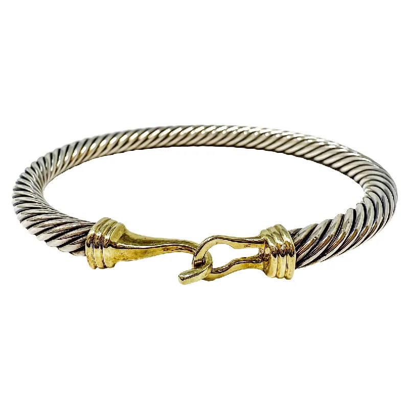 Bangles with twisted metal bands for flair -David Yurman Classic Cable Buckle Bracelet