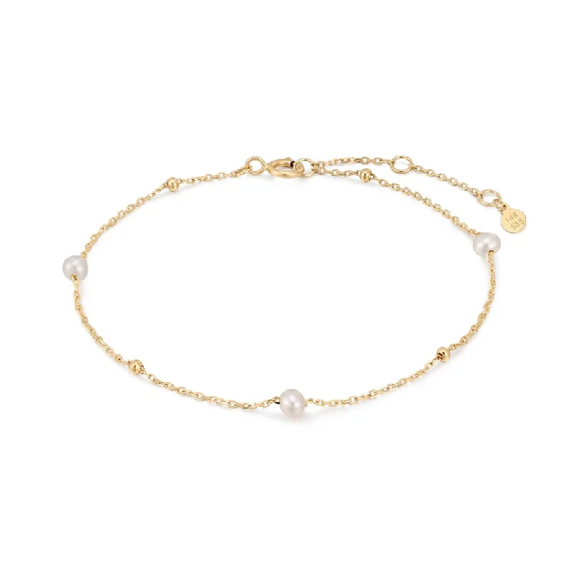 Bracelets with opal gems for iridescent glow -14K Yellow Gold Alternating Bead & Pearl Station Bracelet by Aurelie Gi