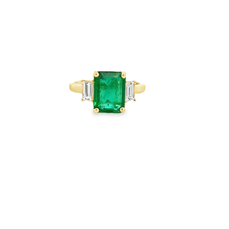 Rings with starburst topaz for radiant beauty -18k Yellow Gold Emerald and Diamond Three-Stone Ring